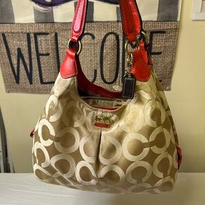 Coach Tan and Orange Signature Monogram Bag featuring Carriage logo on front.